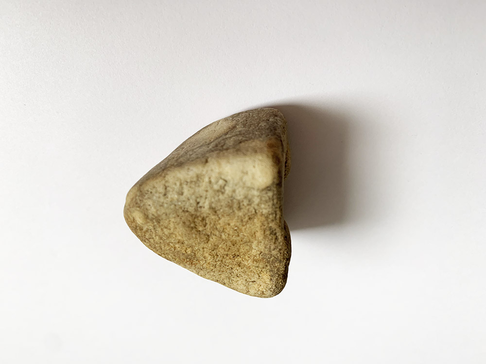Small Crude Triangular Stone